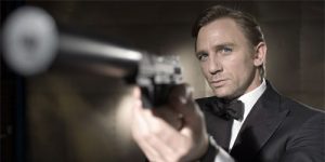 Daniel Craig as James Bond, pointing a gun