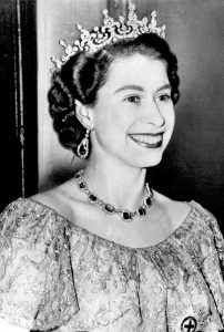 A black and white photo of a young Queen Elizabeth II