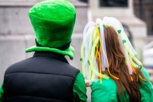 Two people in Irish-themed outfits